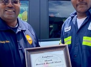 Chief Hart with Derrick Sloan, July 2022 City Employee of the Month