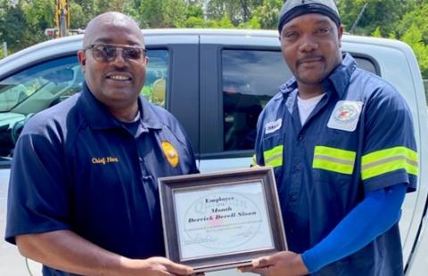 Chief Hart with Derrick Sloan, July 2022 City Employee of the Month